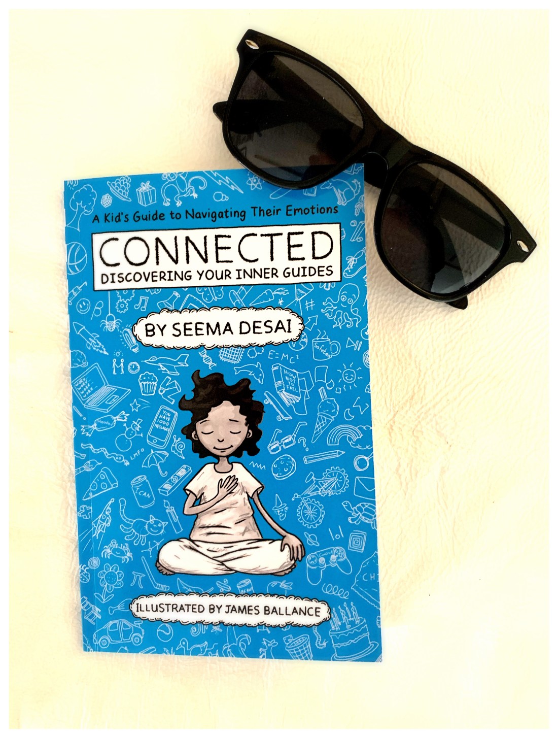 Connected book cover with a pair of sunglasses